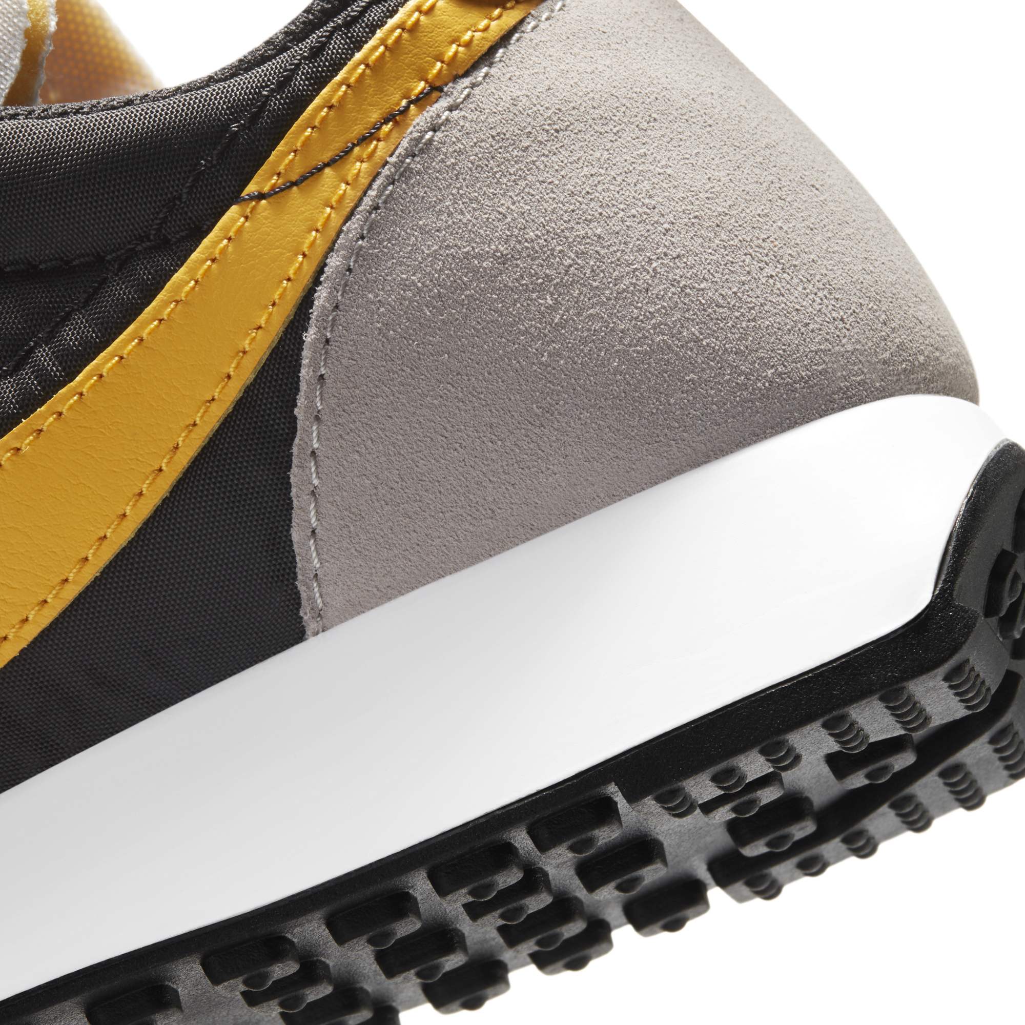 nike tailwind 79 black gold